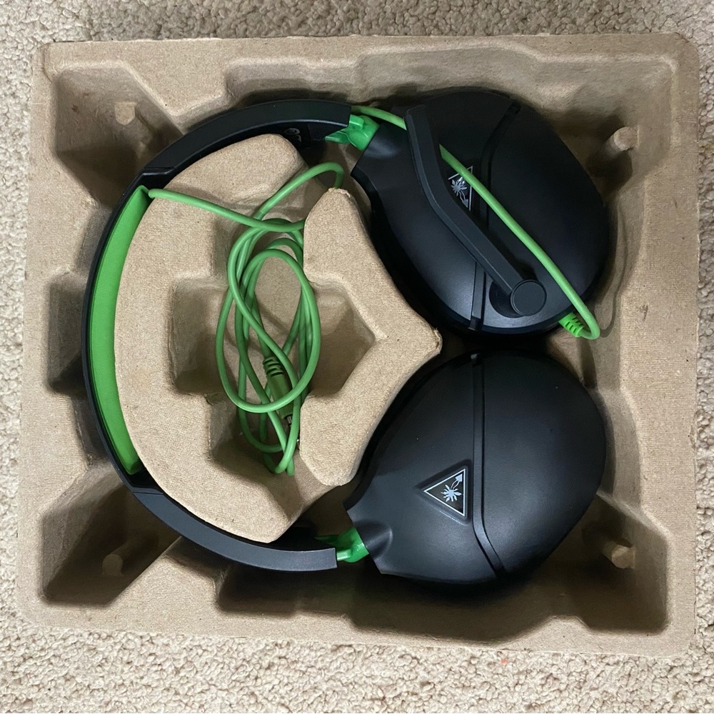 Xbox Series S with headset.